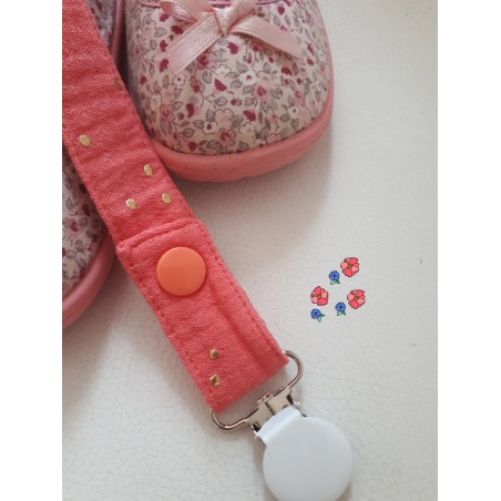 Attache sucette corail et doré